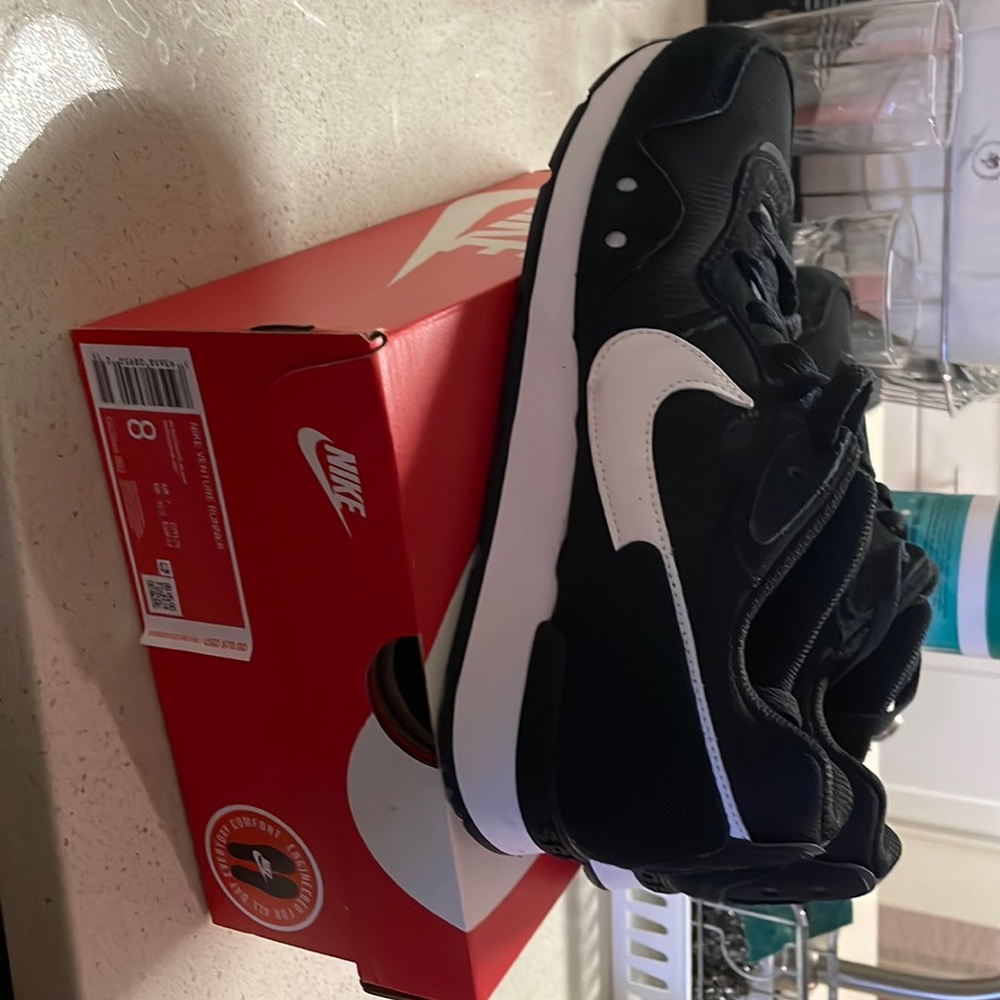 New and never used pair of Nike Venture Runners